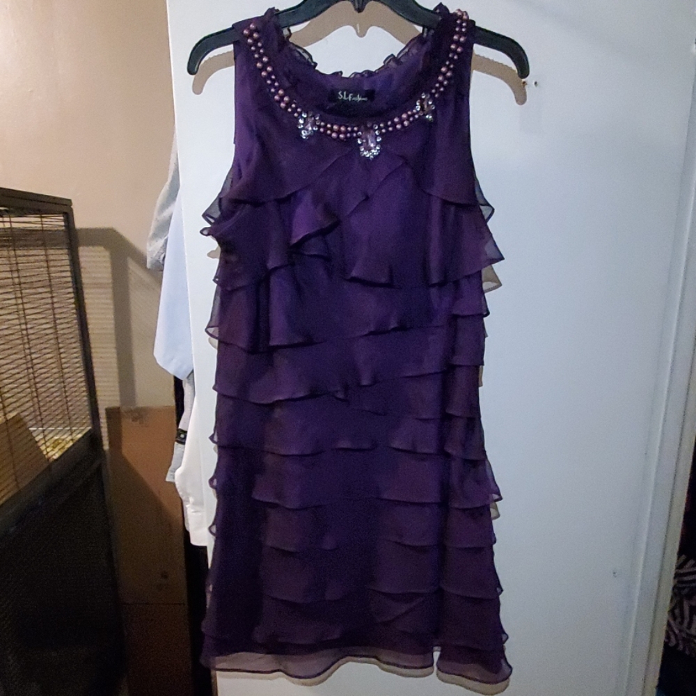 Ruffled dress with beading detail